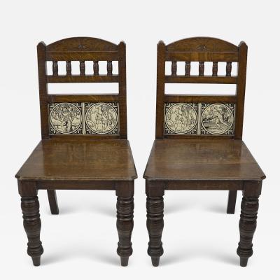 A Pair of Substantial Gothic Revival Oak Hall Chairs with Period Tiles
