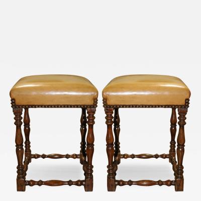 A Pair of Vintage Walnut and Upholstered Stools