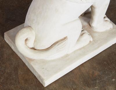 A Pair of White Marble Carved Sphinxes