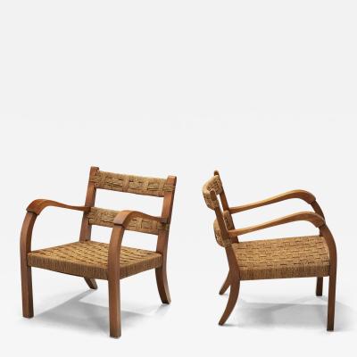 A Pair of Wood and Rattan Armchairs Italy Mid 20th Century