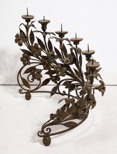 A Pair of Wrought Iron Eight Light Candelabra