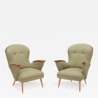 A Pair of restored Danish armchairs with rolled arms Circa 1950