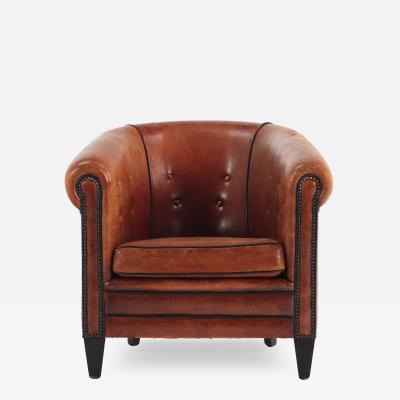 A Patinated Sheepskin Leather Club Chair C 1950 from Holland 