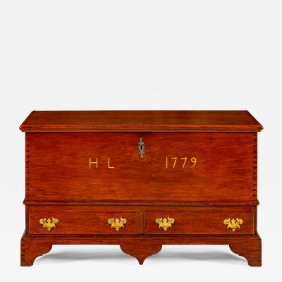 A Pennsylvania German inlaid walnut chest over drawers