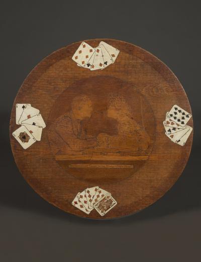 A Pyrographic Polychrome Games Table Decorated with Symbols Universities