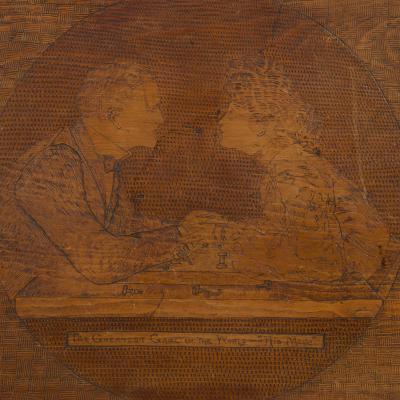 A Pyrographic Polychrome Games Table Decorated with Symbols Universities