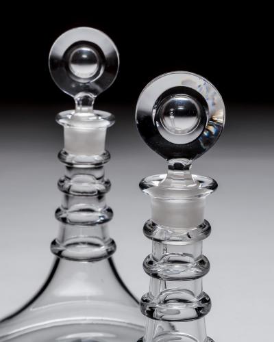 A RARE PAIR OF PLAIN GEORGIAN SHIPS DECANTERS