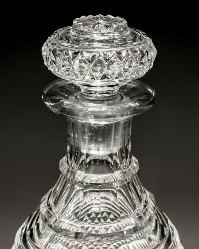 A RARE PEDESTAL FOOTED DIAMOND CUT DECANTER
