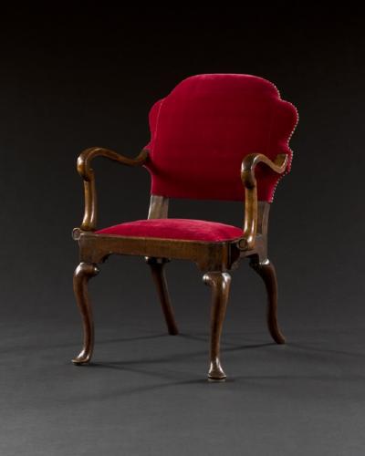 A RARE QUEEN ANNE WALNUT ARMCHAIR OF SMALL PROPORTIONS