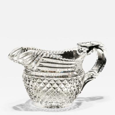 A REGENCY DIAMOND STEP CUT CREAM JUG