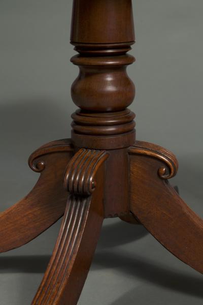 A REGENCY DROP LEAF CENTER TABLE WITH INSET DERBYSHIRE FOSSIL MARBLE TOP