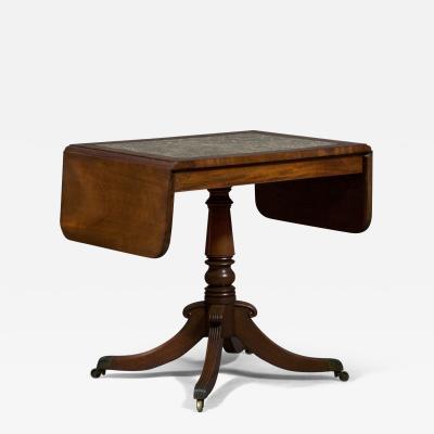 A REGENCY DROP LEAF CENTER TABLE WITH INSET DERBYSHIRE FOSSIL MARBLE TOP