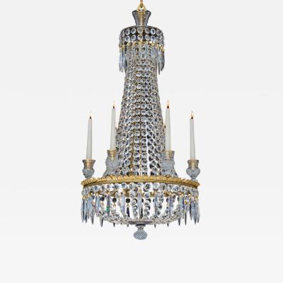 A REGENCY SIX LIGHT CRYSTAL CHANDELIER