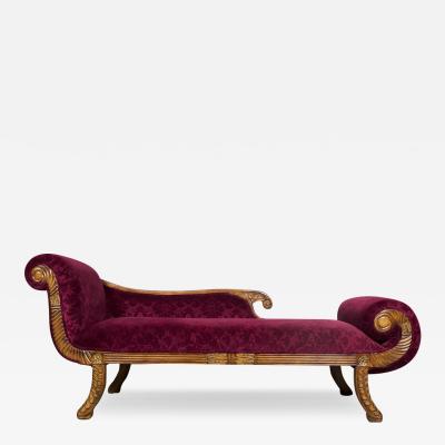 A REGENCY STYLE UPHOLSTERED LOUNGE SOFA DAY BED