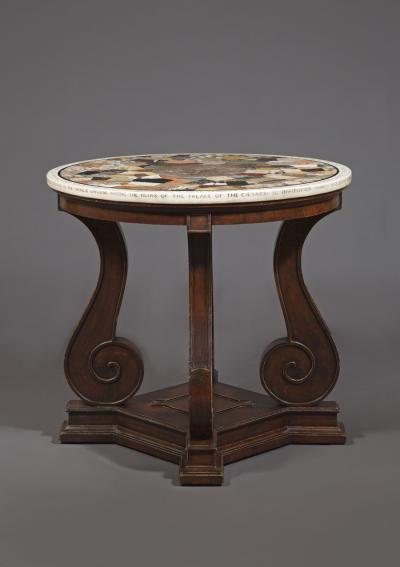 A REMARKABLE CENTER TABLE WITH INSCRIBED TOP MADE WITH A MOSAIC