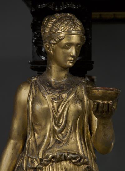 A REMARKABLE EBONIZED AND GILT SIDE TABLE