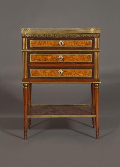 A REMARKABLE NOEUD DE VIGNE VENEERED AND MAHOGANY BRASS INLAID PETITE COMMODE