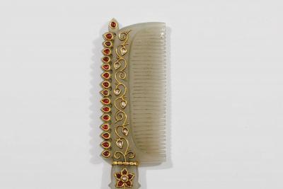 A Rare Mughal Style Gem Set Jade Hand Mirror and Comb India Late 19th Century