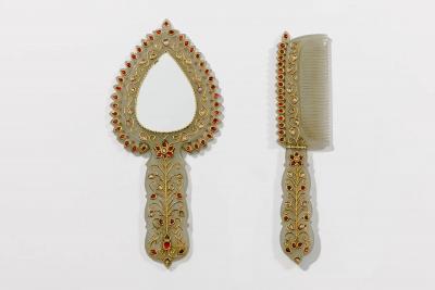 A Rare Mughal Style Gem Set Jade Hand Mirror and Comb India Late 19th Century
