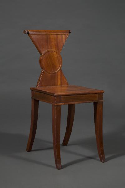 A Rare Pair of Regency Mahogany Hourglass Form Hall Chairs