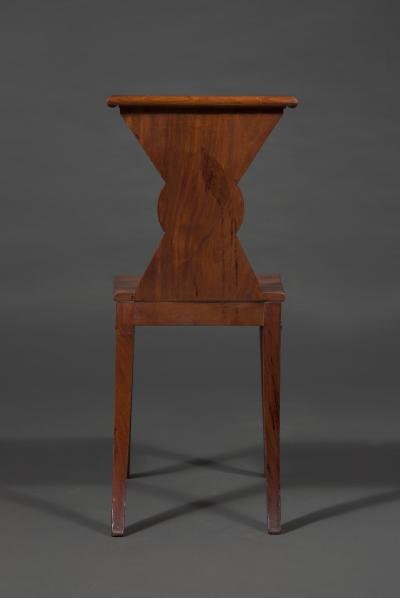 A Rare Pair of Regency Mahogany Hourglass Form Hall Chairs
