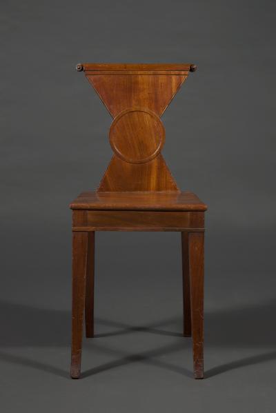 A Rare Pair of Regency Mahogany Hourglass Form Hall Chairs