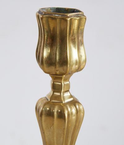 A Rare Set of Four Louis XIV Brass Candlesticks c 1690