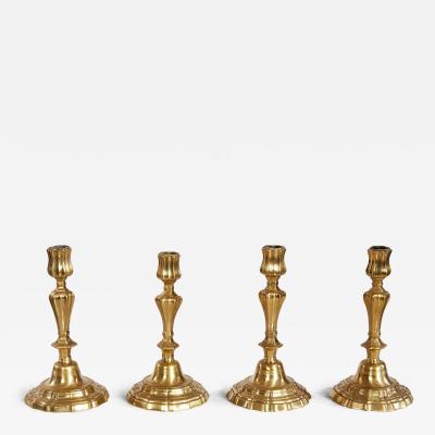 A Rare Set of Four Louis XIV Brass Candlesticks c 1690