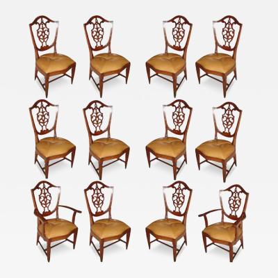 A Rare Set of Twelve 18th Century Italian Walnut Dining Chairs