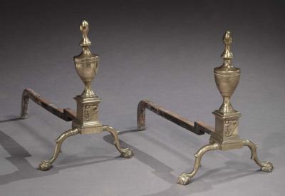 A Rare and Important Pair of Brass Andirons