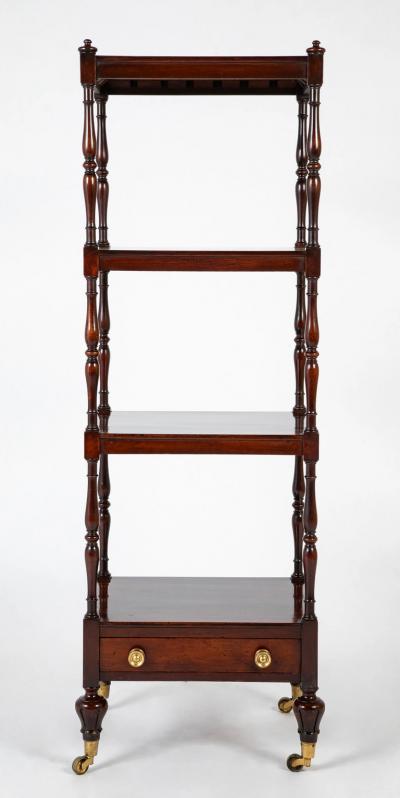 A Regency Four Tier Etagere with Rare Lotus Carved Legs