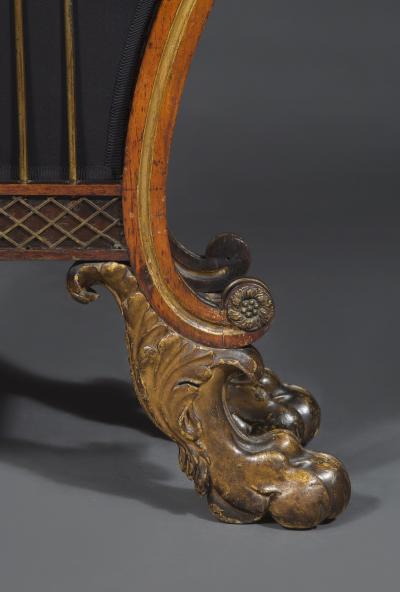 A Regency Lyre Form Rosewood And Giltwood Console Table