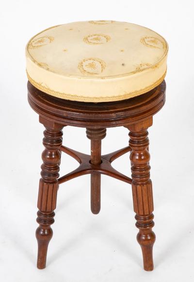 A Regency Reeded Leg Mahogany Revolving Stool