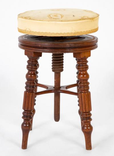 A Regency Reeded Leg Mahogany Revolving Stool