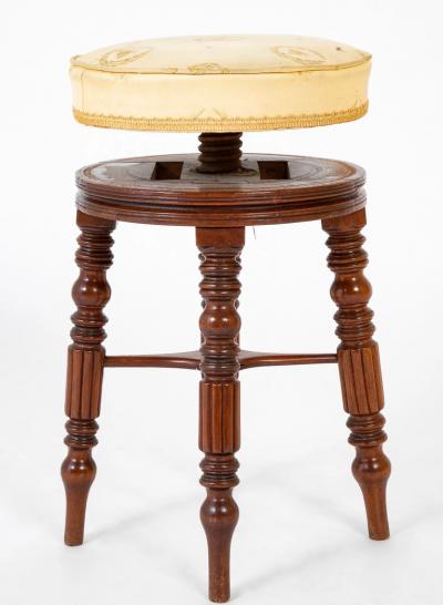 A Regency Reeded Leg Mahogany Revolving Stool