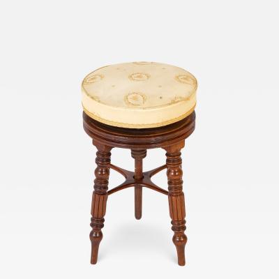 A Regency Reeded Leg Mahogany Revolving Stool