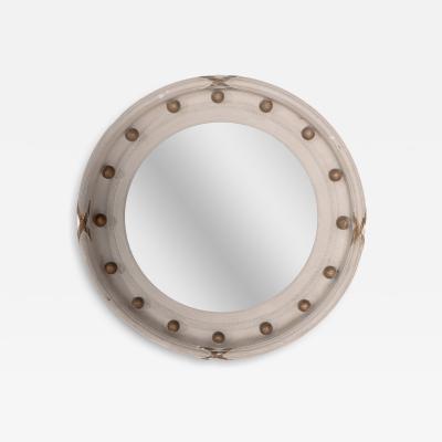 A Regency Style Circular Convex Mirror with Ball Ribbon Decoration