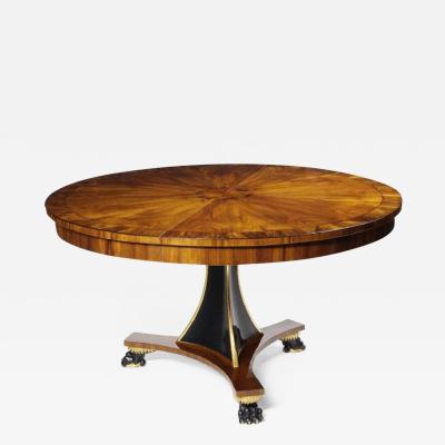 A Regency Style Extendable Single Pedestal Dining Table by Iliad Design