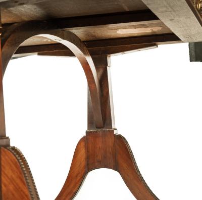 A Regency brass inlaid rosewood sofa table attributed to Gillows