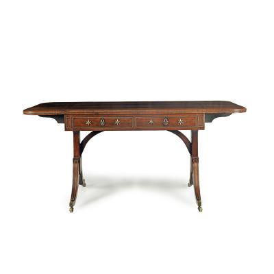 A Regency brass inlaid rosewood sofa table attributed to Gillows