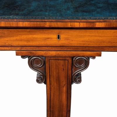 A Regency mahogany end support library table