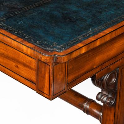 A Regency mahogany end support library table
