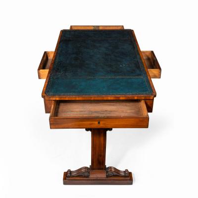 A Regency mahogany end support library table
