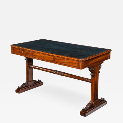 A Regency mahogany end support library table