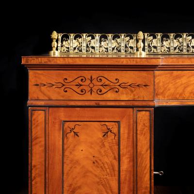 A Regency pale mahogany pedestal sideboard