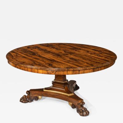 A Regency rosewood five foot tilt top centre table