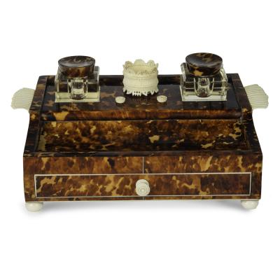 A Regency tortoiseshell and ivory desk set