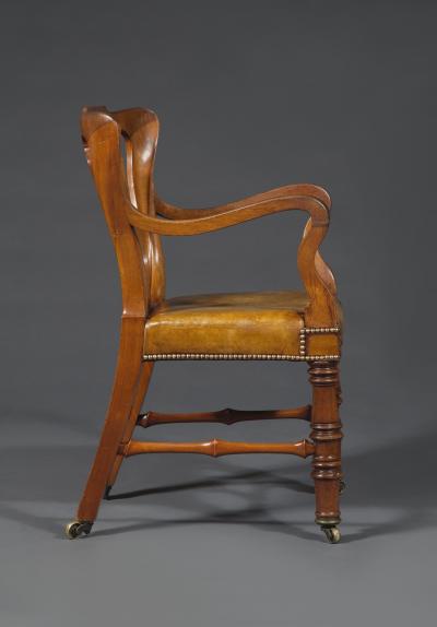 A Remarkable Pair of Mahogany Library Armchairs of Large Scale
