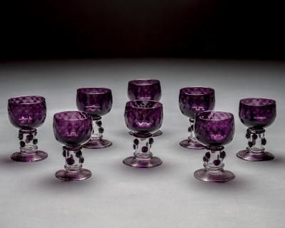 A SET OF EIGHT AMETHYST ROEMERS
