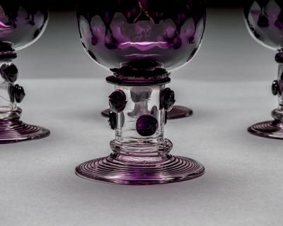 A SET OF EIGHT AMETHYST ROEMERS